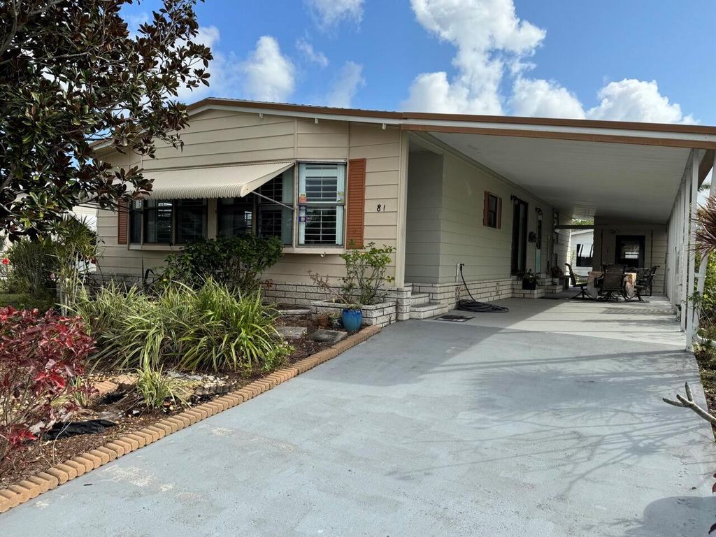 Photo of 81 Lagos Del Norte, Fort Pierce, FL 34951 (MLS # R11051864)