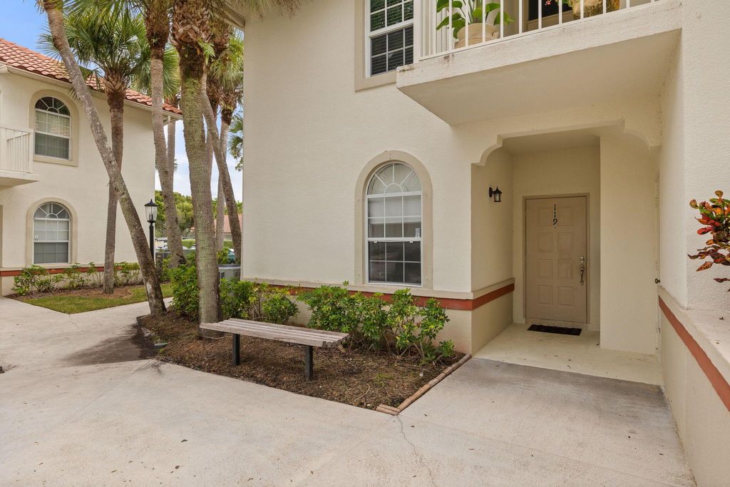 Photo of 119 Cypress Point Drive, Palm Beach Gardens, FL 33418 (MLS # R10935776)