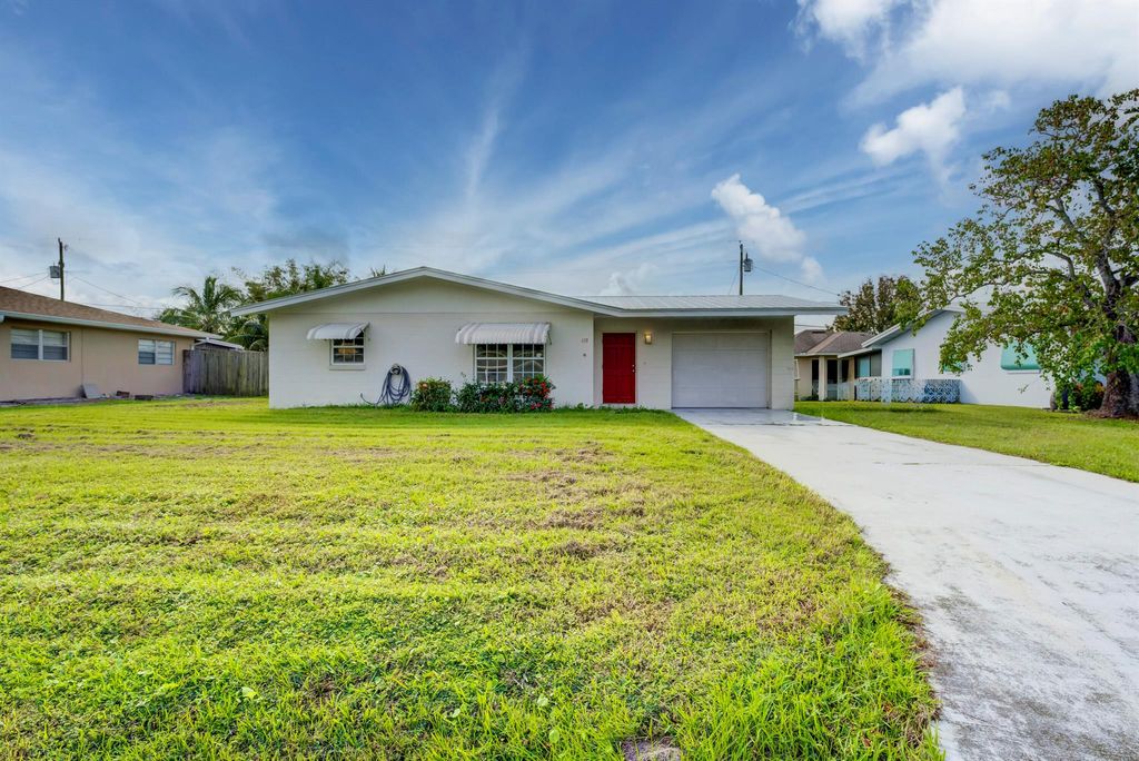 Photo of 618 Beach Avenue, Port Saint Lucie, FL 34952 (MLS # R10939024)