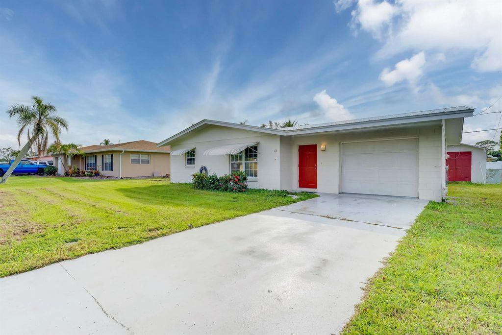 Photo of 618 Beach Avenue, Port Saint Lucie, FL 34952 (MLS # R10939024)