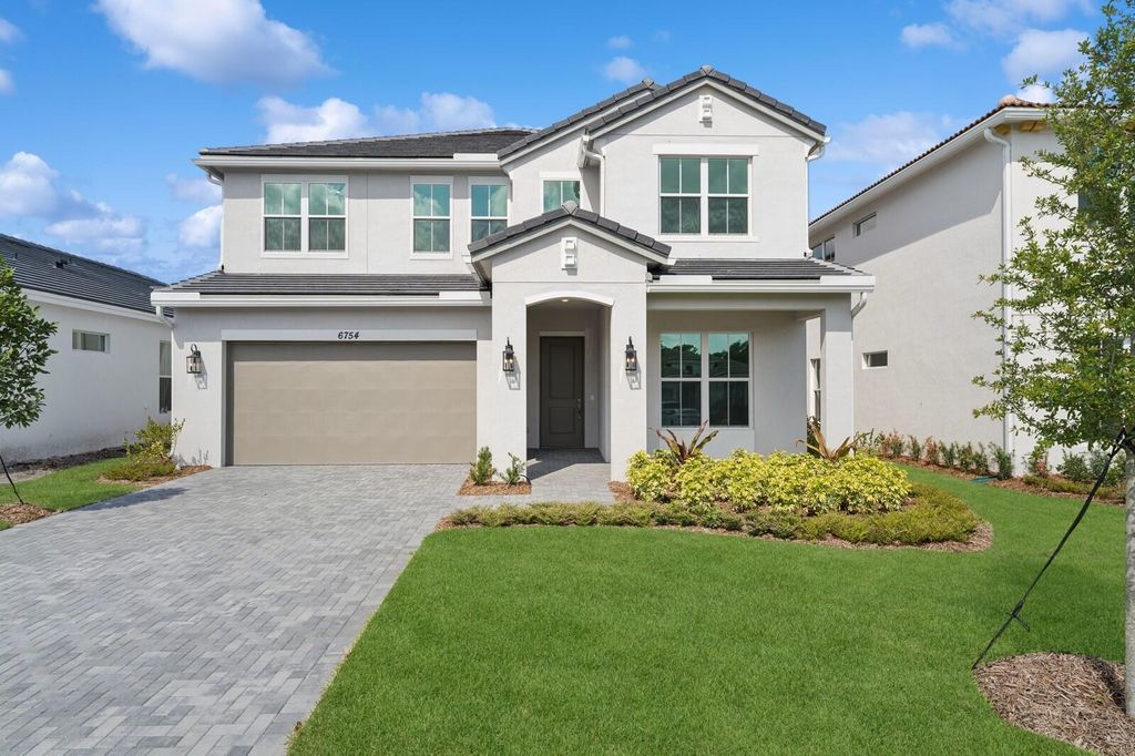 Photo of 6754 SE Lost Pine Drive #20, Stuart, FL 34997 (MLS # R11082418)