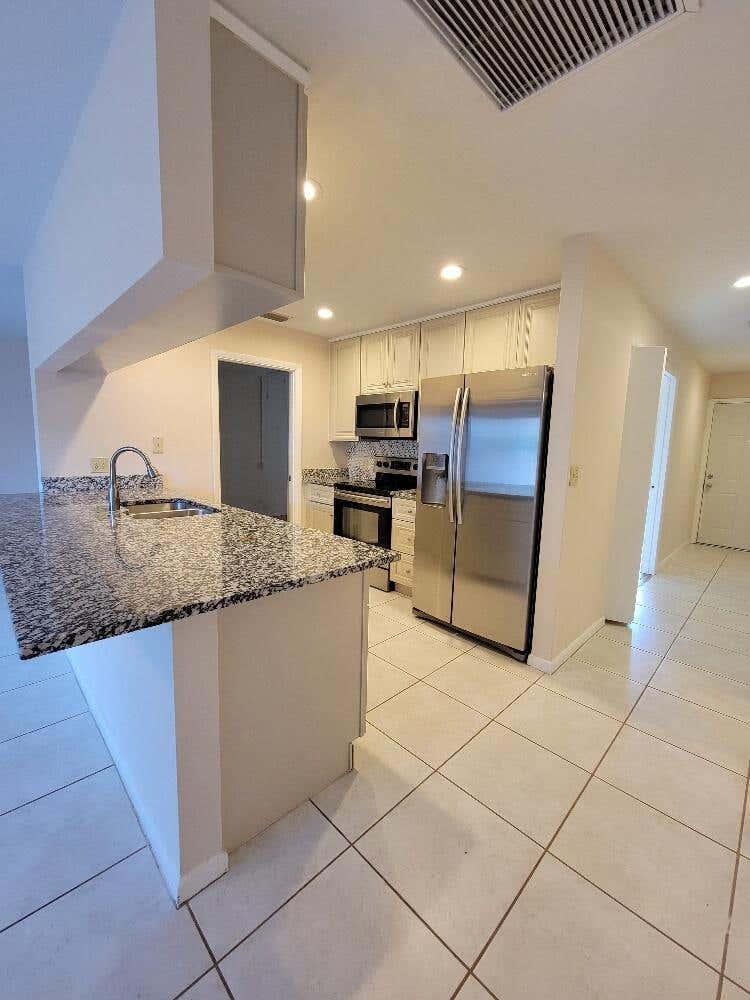 Photo of 1087 Goldenrod Road, Wellington, FL 33414 (MLS # R10973801)