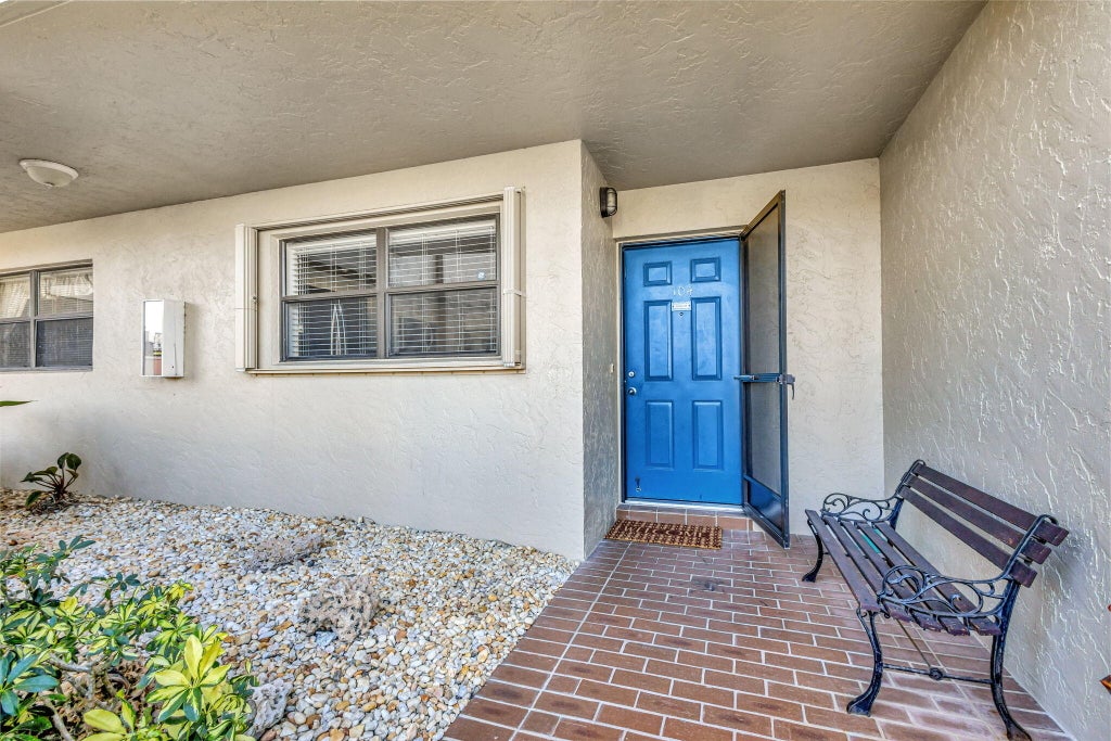 Photo of 13335 Touchstone Place #104, Palm Beach Gardens, FL 33418 (MLS # R11042847)