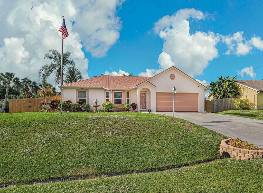 Photo of 2074 SW Certosa Road, Port Saint Lucie, FL 34953 (MLS # R11049109)
