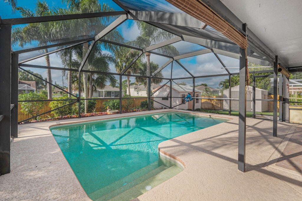 Photo of 2074 SW Certosa Road, Port Saint Lucie, FL 34953 (MLS # R11049109)