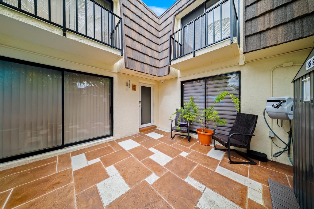 Photo of 1524 Forest Lakes Circle, West Palm Beach, FL 33406 (MLS # B26004375)