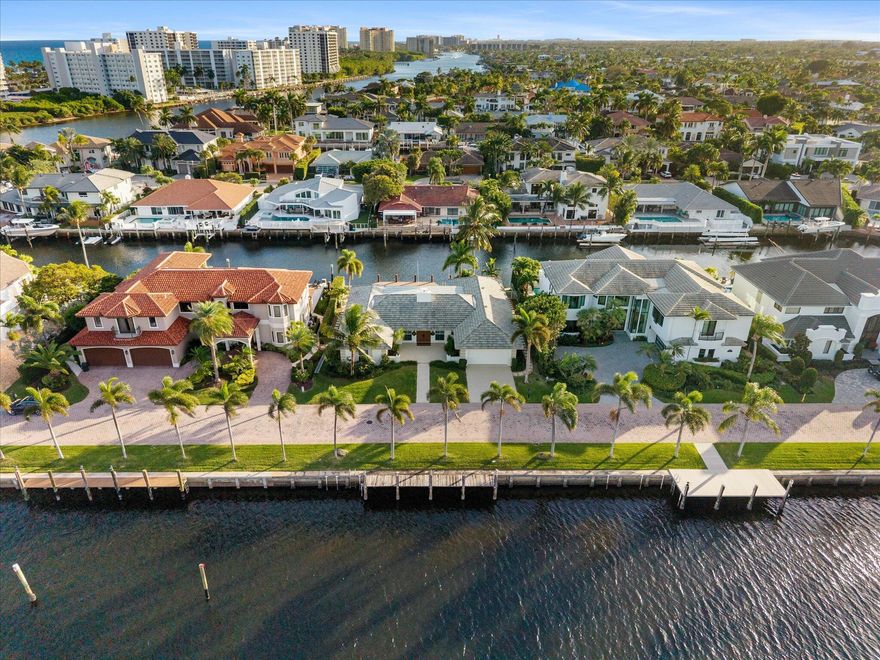 Most waterfront homes give you one view. This one surrounds you with 180+ feet of it. Double waterfront isn't just a feature - it's a lifestyle that only a handful of properties in Boca can claim.
Fresh from a complete transformation, 872 Lilac Drive doesn't apologize for being different. The design is clean, modern, unapologetically bright. Light wood floors lead you through spaces that actually make sense - a kitchen that opens instead of closes you off, rooms that breathe, a fireplace wrapped in stone that commands attention without trying too hard.
The kitchen? White, crisp, built for someone who actually cooks. Or orders in. Either way, you'll look good doing it.
Step outside and the real magic happens. Your pool. Your dock. Your 180+ feet of water that most people only dream about. Boats glide by. Sunsets paint the sky. You're in a gated community, but it feels like your own private island.
Minutes to Mizner Park, Atlantic Avenue, Palm Beach, and everything that makes South Florida irresistible. The best restaurants, shopping, and beaches are your neighbors.
The renovations weren't subtle - new bathrooms with marble that matters, walk-in closets that actually fit your wardrobe, finishes that photograph well and live even better.
This isn't a house that begs for attention. It just quietly flexes with double waterfront access while everyone else is stuck with one view.