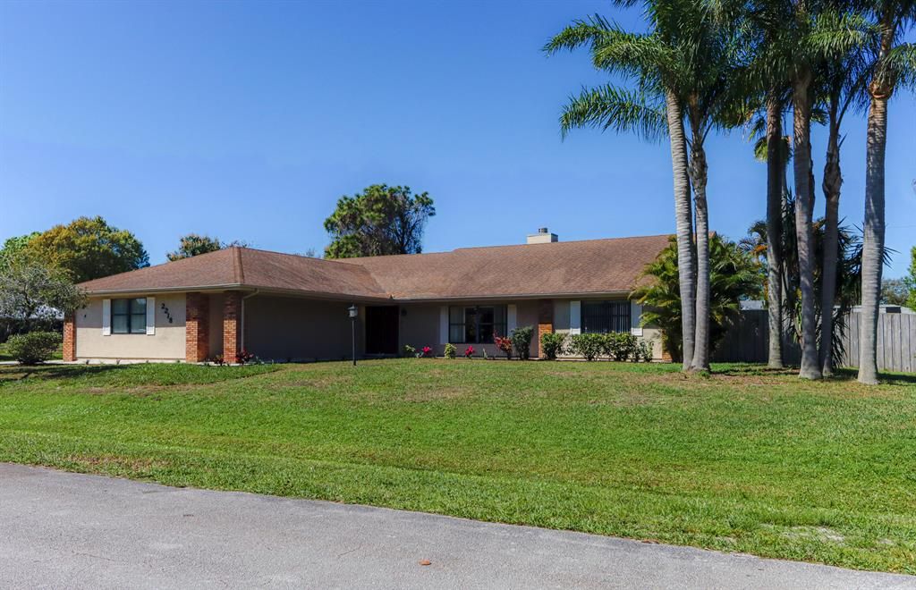 Photo of 2218 SE Abcor Road, Port Saint Lucie, FL 34952 (MLS # R10694133)