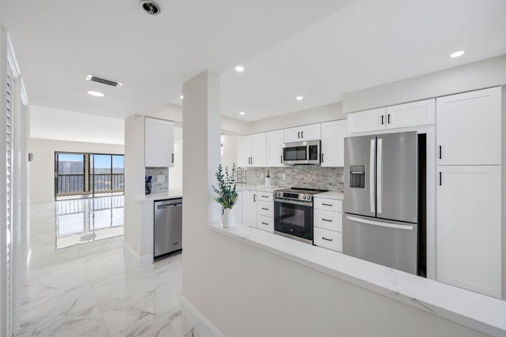 Photo of 7290 Kinghurst Drive #709, Delray Beach, FL 33446 (MLS # R11133485)