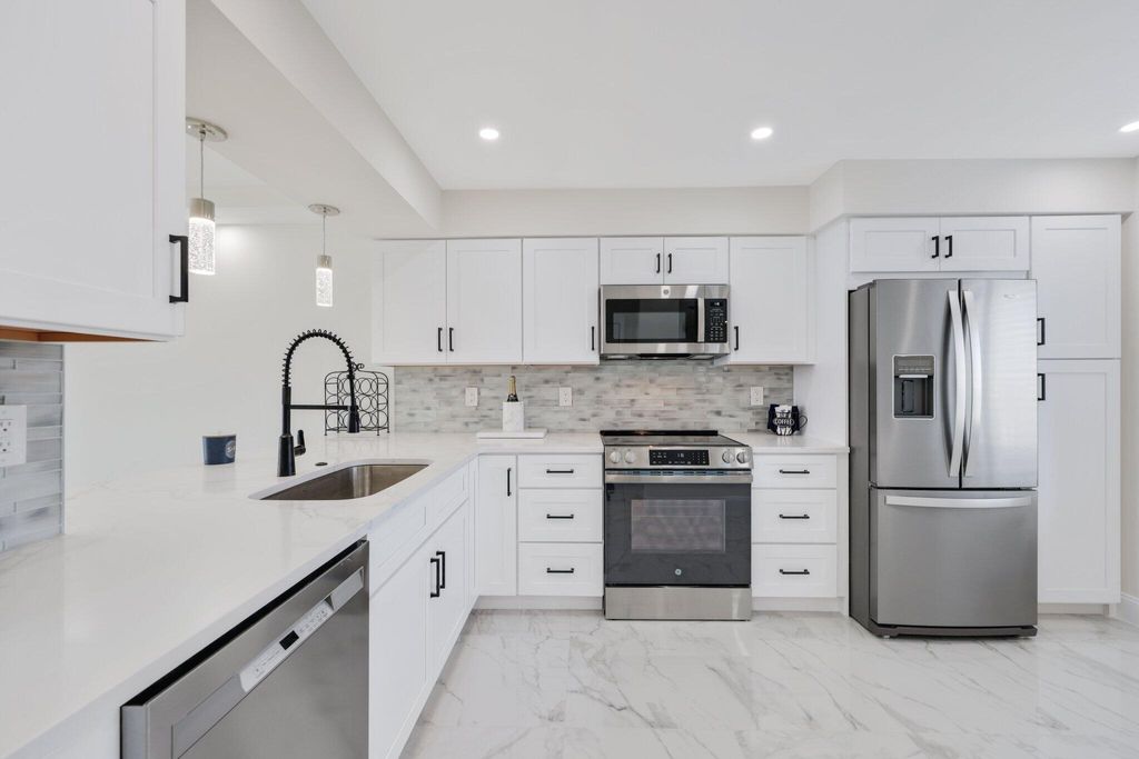 Photo of 7290 Kinghurst Drive #709, Delray Beach, FL 33446 (MLS # R11133485)