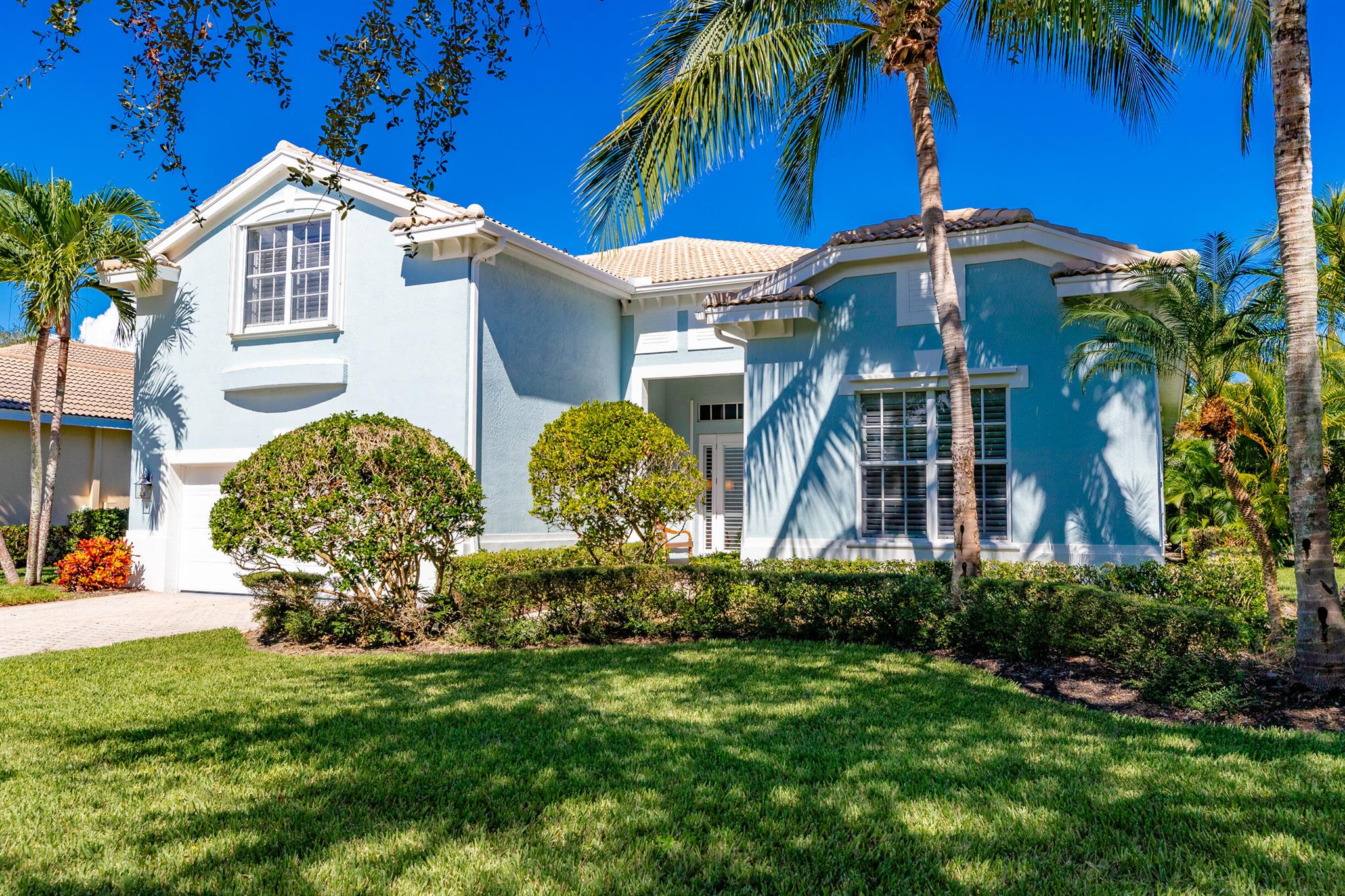 Escape to a refined Florida winter retreat. This sophisticated, turn-key residence on Vero Beach's coveted barrier island offers timeless elegance and effortless luxury. Impeccably furnished with sunlit living spaces, a gourmet kitchen, and a private tropical pool oasis. Steps from pristine beaches, fine dining, and boutique shopping--experience the art of island living.