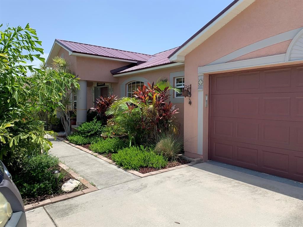 Photo of 2250 SE Lucaya Street, Port Saint Lucie, FL 34952 (MLS # R10818412)