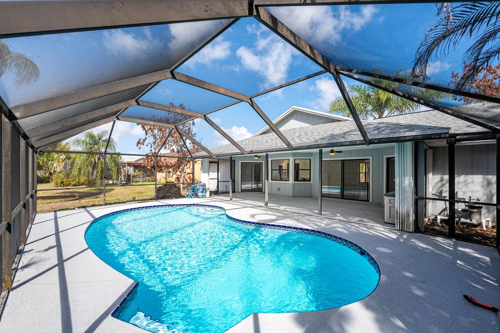 Photo of 2482 SW Avondale Street, Port Saint Lucie, FL 34984 (MLS # R11168798)