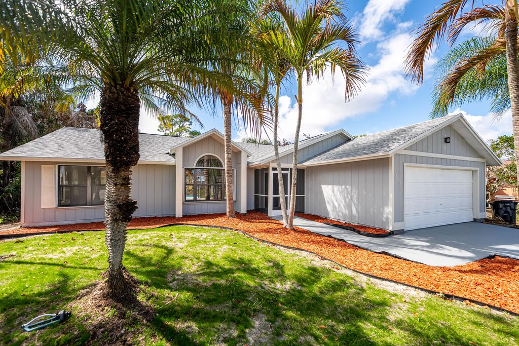 Photo of 2482 SW Avondale Street, Port Saint Lucie, FL 34984 (MLS # R11168798)