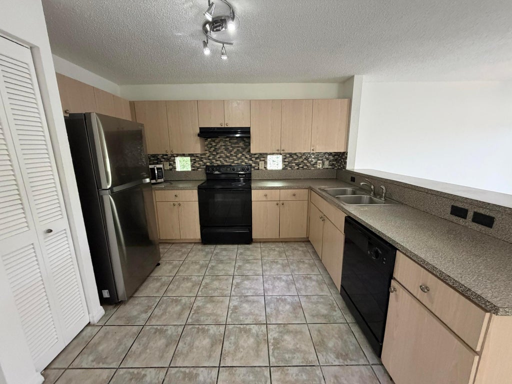 Photo of 4172 Pine Hollow Circle, Greenacres, FL 33463 (MLS # B26066989)