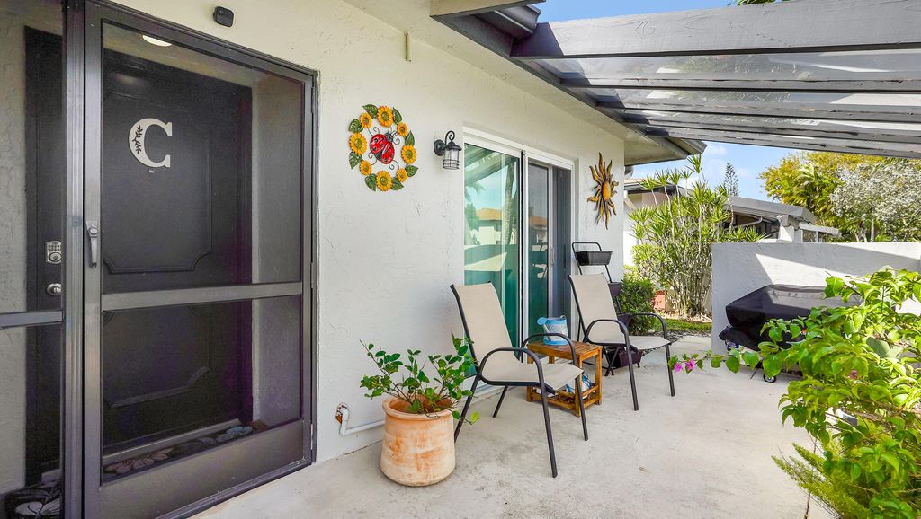 Photo of 5620 Queen Palm Court #C, Delray Beach, FL 33484 (MLS # B26005175)