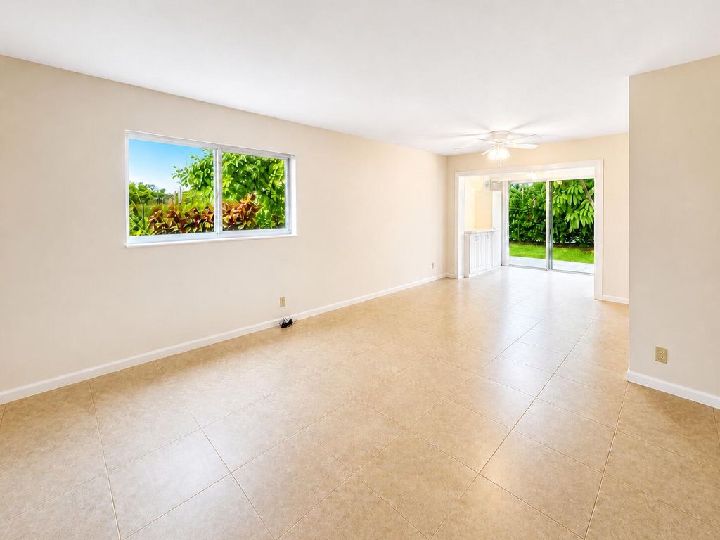 Photo of 25 Colonial Club Drive #101, Boynton Beach, FL 33435 (MLS # B26024808)