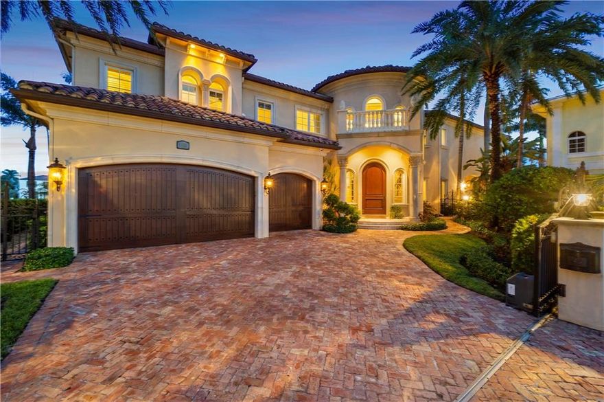 Summit built gated custom estate with stunning views of the Hillsboro Lighthouse and Lake Placid from this home with 203’ of the best waterfront. Bright open floor plan with spectacular sights from every window. Elevator ready. Stone floors throughout the living areas with 5 bedrooms and 5 1/2 baths. There is a gourmet kitchen with double Wolf ovens, Wolf gas range, walk in pantry and prep island. Beautiful master suite with ideal balcony to take in the views, luxurious bathroom with large Jacuzzi tub, 2 huge walk-in closets. Other features include large second floor loft/library, fireplace, laundries on both floors, outdoor kitchen with fireplace, separate from house, an office or guest suite/bath and closet. All of this - on one of the best lots in the area on a quiet cul-de-sac street!