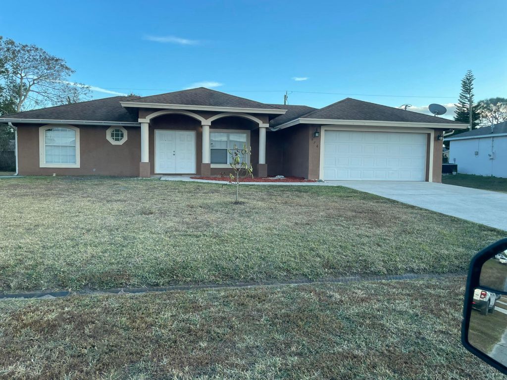 Photo of 976 SW Whittier Terrace, Port Saint Lucie, FL 34953 (MLS # R11161534)