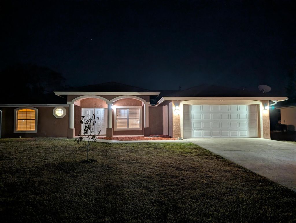 Photo of 976 SW Whittier Terrace, Port Saint Lucie, FL 34953 (MLS # R11161534)