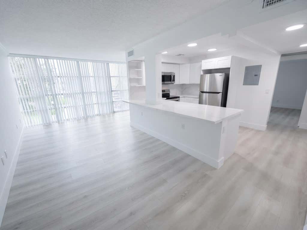 Photo of 801 Three Islands Boulevard #209, Hallandale Beach, FL 33009 (MLS # B26057974)