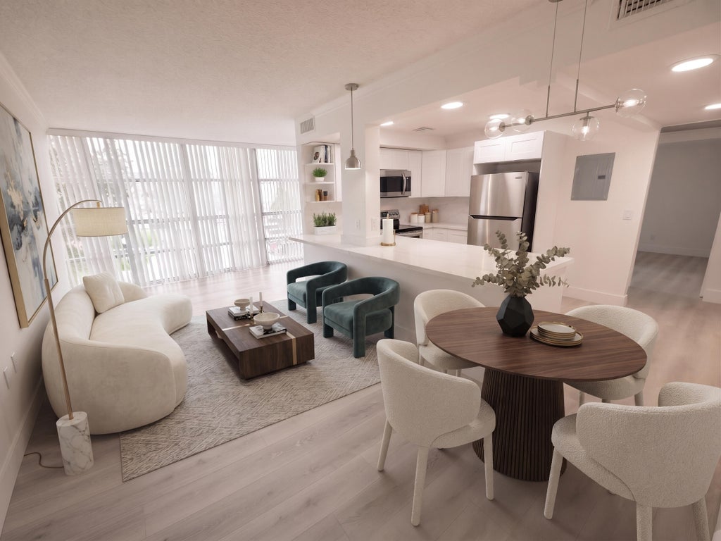 Photo of 801 Three Islands Boulevard #209, Hallandale Beach, FL 33009 (MLS # B26057974)
