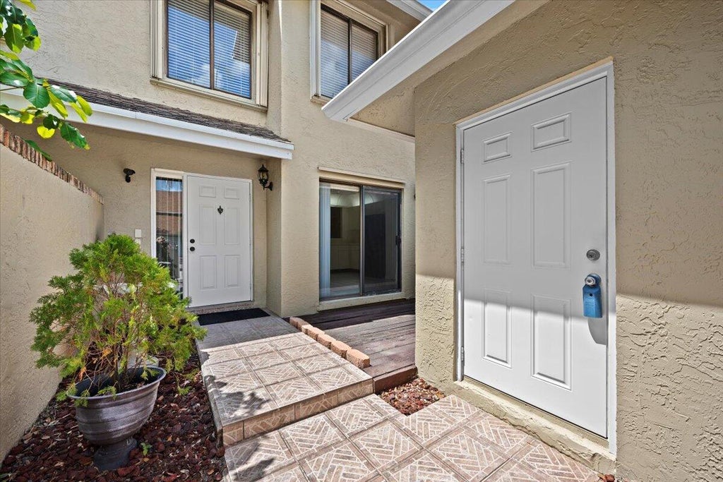Photo of 804 Maplewood Drive, Greenacres, FL 33415 (MLS # R11083897)