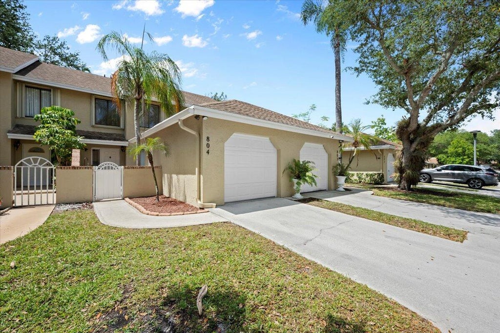 Photo of 804 Maplewood Drive, Greenacres, FL 33415 (MLS # R11083897)