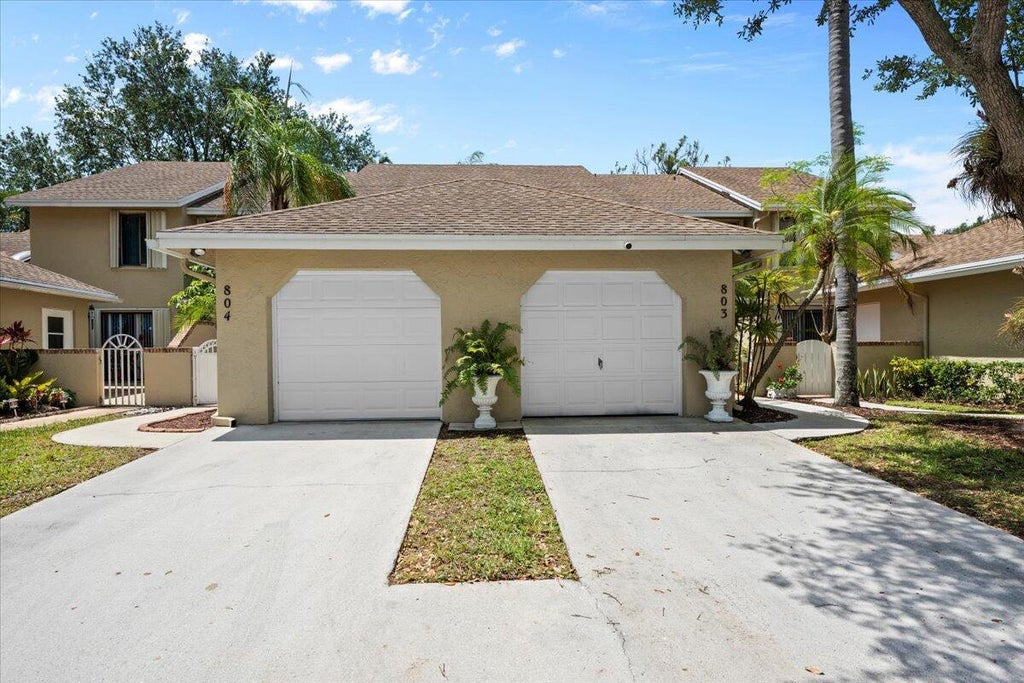 Photo of 804 Maplewood Drive, Greenacres, FL 33415 (MLS # R11083897)
