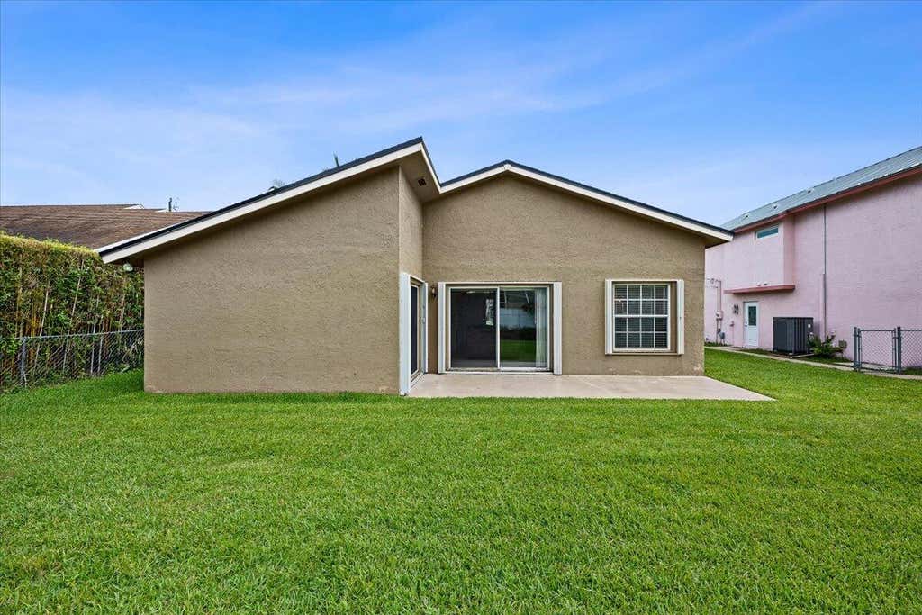 Photo of 6397 Garrett Street, Jupiter, FL 33458 (MLS # B26051622)