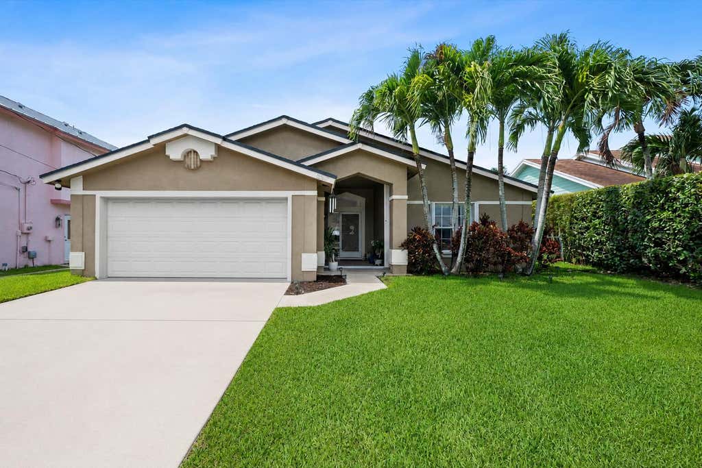 Photo of 6397 Garrett Street, Jupiter, FL 33458 (MLS # B26051622)