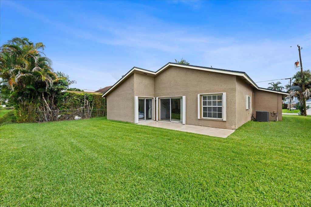 Photo of 6397 Garrett Street, Jupiter, FL 33458 (MLS # B26051622)