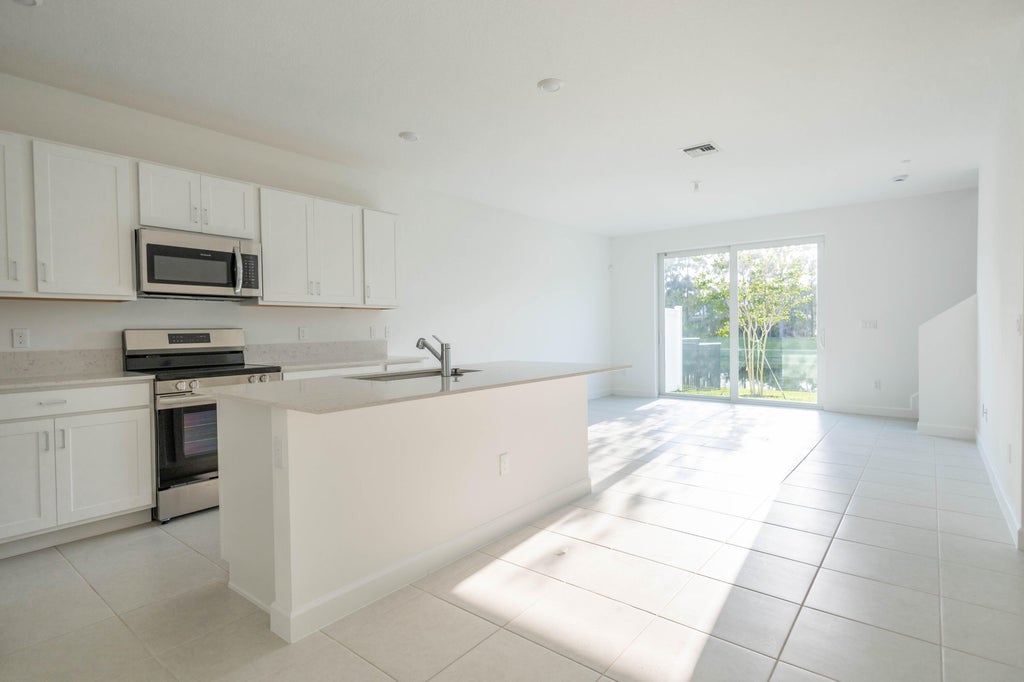 Photo of 5303 Flannigan Way, Lake Worth, FL 33463 (MLS # B26047174)
