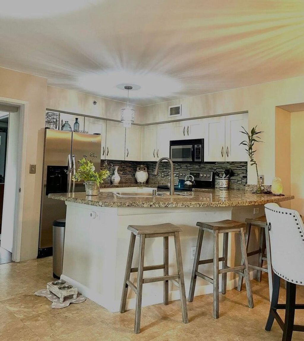 Photo of 3111 Clint Moore 106 Road #106, Boca Raton, FL 33496 (MLS # R11145593)