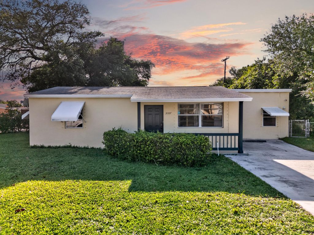 Photo of 3107 Avenue F, Riviera Beach, FL 33404 (MLS # B26017964)