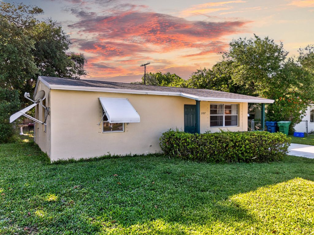 Photo of 3107 Avenue F, Riviera Beach, FL 33404 (MLS # B26017964)