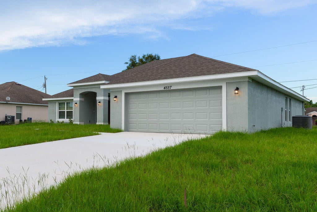 Photo of 4557 SW VAN DYKE Street, Port Saint Lucie, FL 34953 (MLS # B26076440)