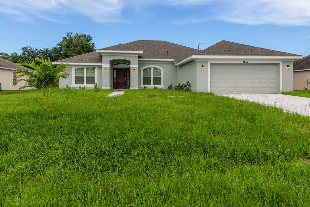 Photo of 4557 SW VAN DYKE Street, Port Saint Lucie, FL 34953 (MLS # B26076440)