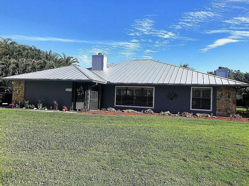 Photo of 16826 126th Terrace N, Jupiter, FL 33478 (MLS # B26008235)