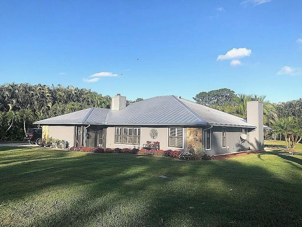 Photo of 16826 126th Terrace N, Jupiter, FL 33478 (MLS # B26008235)