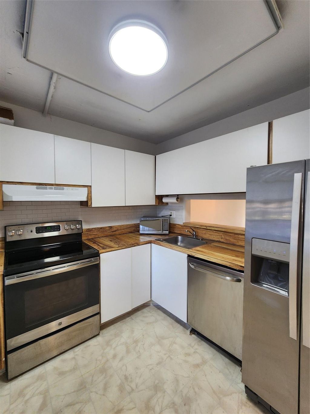 Photo of 3341 NW 47th Terrace #211, Lauderdale Lakes, FL 33319 (MLS # F10496393)