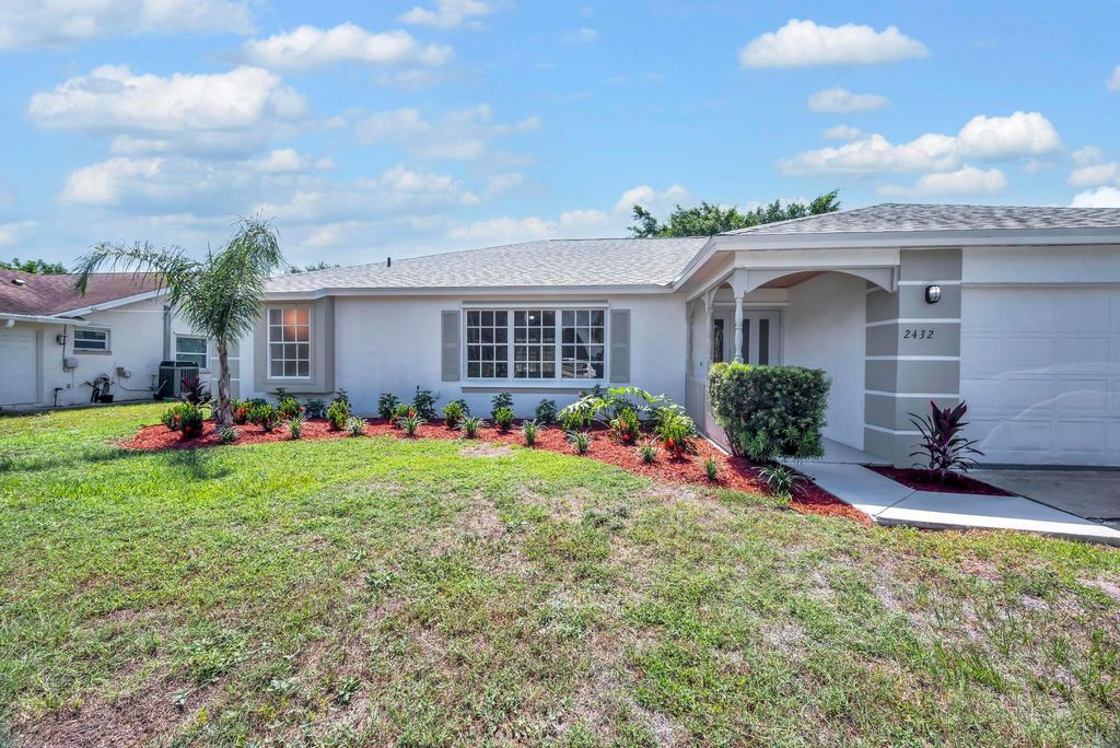 Photo of 2432 SE Floresta Drive, Port Saint Lucie, FL 34984 (MLS # R11102901)