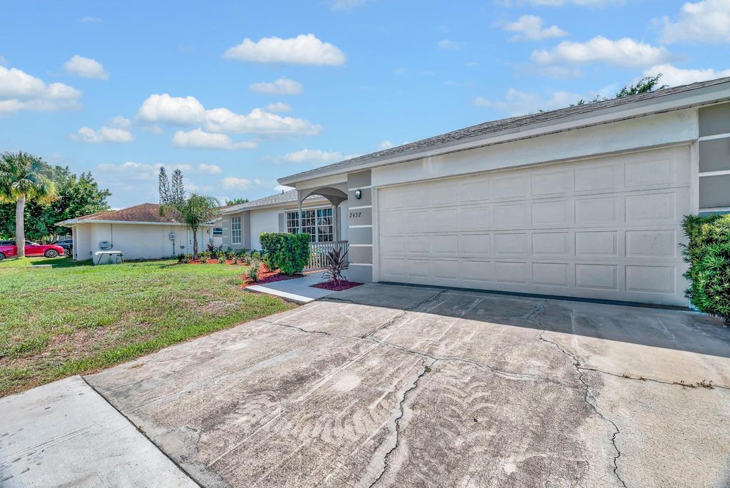Photo of 2432 SE Floresta Drive, Port Saint Lucie, FL 34984 (MLS # R11102901)