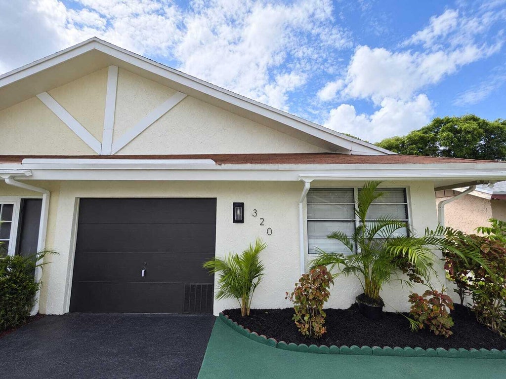 Photo of 1320 SW 75TH Avenue, North Lauderdale, FL 33068 (MLS # B26084256)