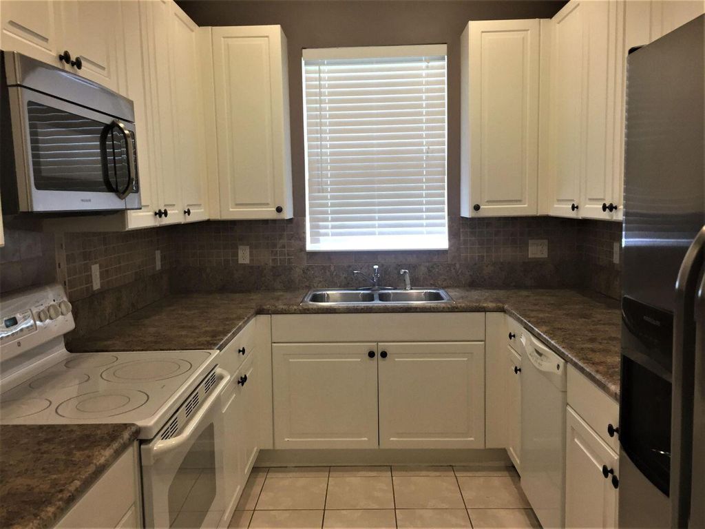 Photo of 392 SE Bloxham Way, Stuart, FL 34997 (MLS # R10792605)