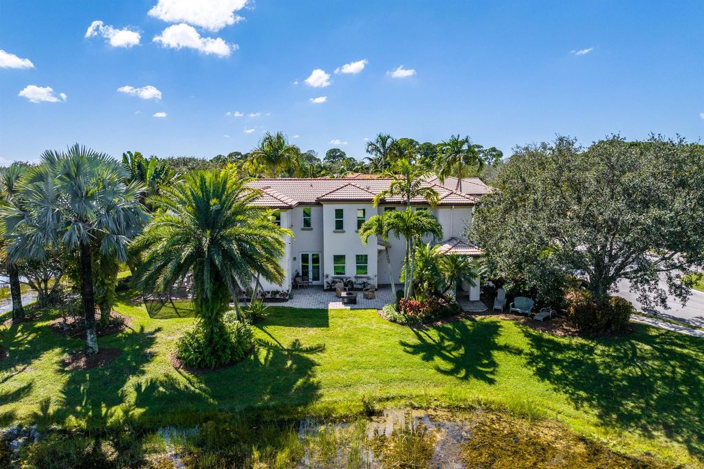 Photo of 1920 Flower Drive, Palm Beach Gardens, FL 33410 (MLS # R10930823)