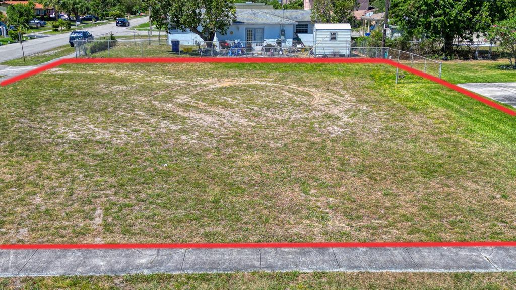 Photo of 398 W 23rd Street, Riviera Beach, FL 33404 (MLS # R11166382)