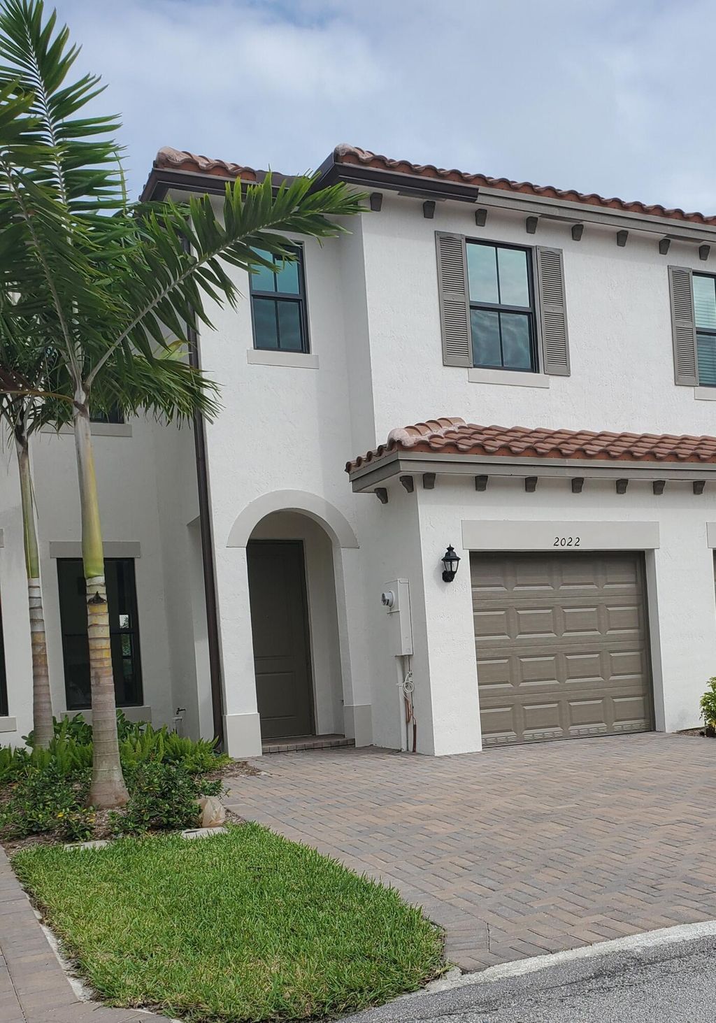 Photo of 2022 S Oysterwood Lane S, Riviera Beach, FL 33410 (MLS # R11114108)