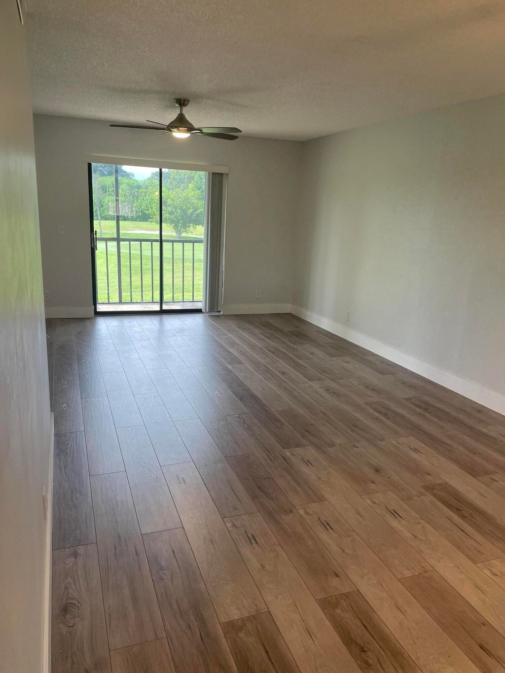 Photo of 7101 GOLF COLONY Court #201, Lake Worth, FL 33467 (MLS # B26078459)