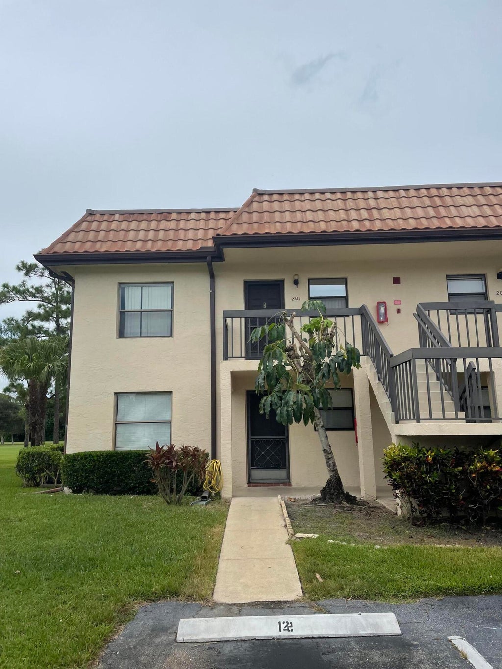 Photo of 7101 GOLF COLONY Court #201, Lake Worth, FL 33467 (MLS # B26078459)